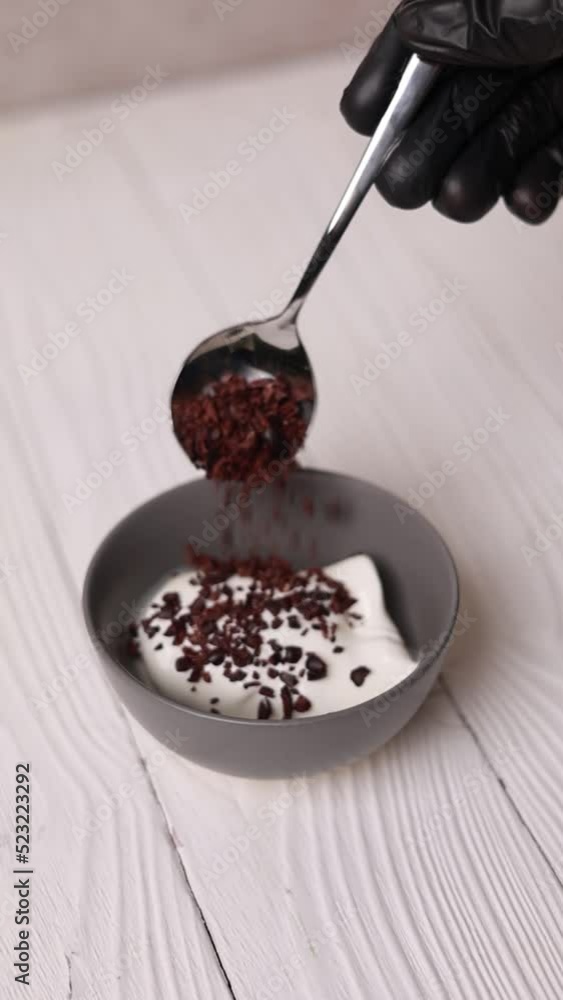 A confectioner prepares a dessert
A confectioner prepares a dessert