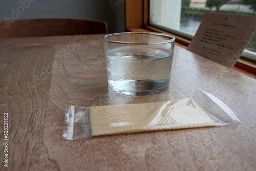 カフェで出された水とおしぼり photo