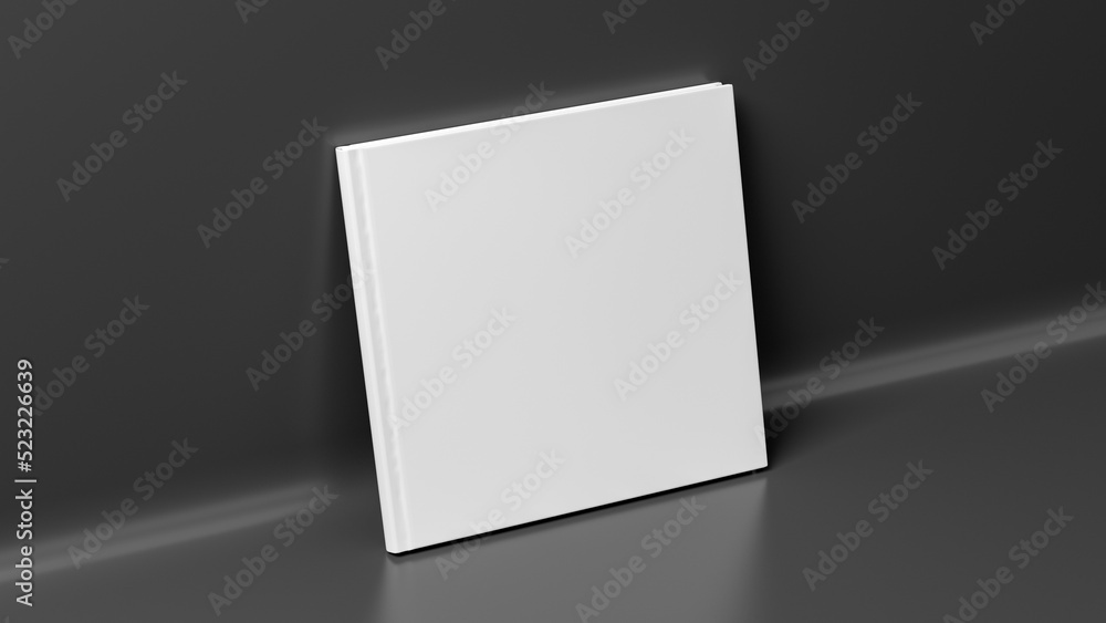 Blank square hardcover book cover mockup standing on black background Blank square hardcover book cover mockup standing on black background