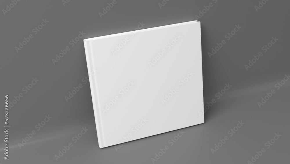 Blank square hardcover book cover mockup standing on gray background Blank square hardcover book cover mockup standing on gray background