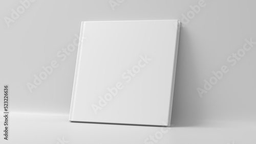 Blank square hardcover book cover mockup standing on white background