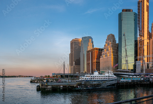 View of the Manhattan Skyline Across from Pier Early in the Morning with Clear Skies © porqueno