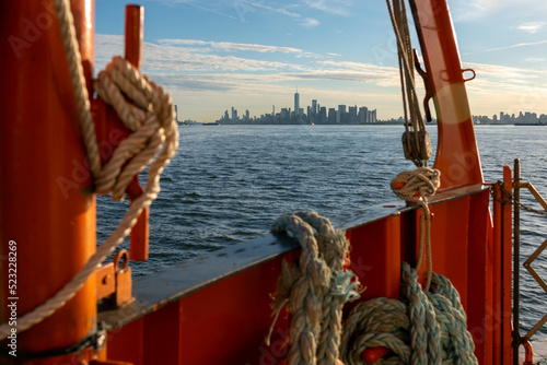 The Manhattan Island Skyline in the background from the rear of the Staten Island Ferry