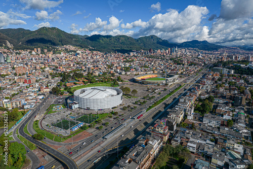 Carrera 30 de la ciudad de Bogotá ( Colombia), donde se puede visualizar el movistar arena y el estadio el campin y el lago del parque de los novios en primer plano y al fondo el centro de la ciudad. photo