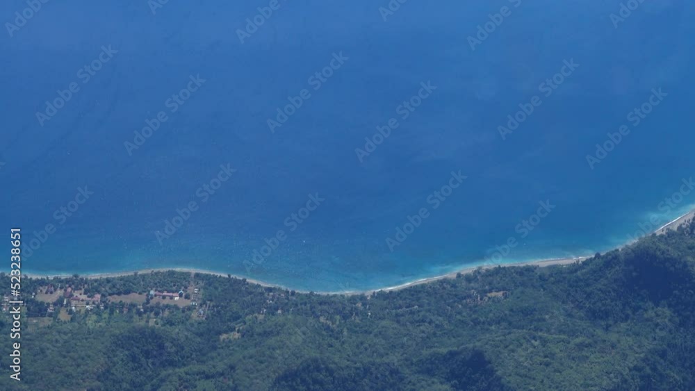 Aerial shot of tropical volcanic islands from plane Aerial shot of tropical volcanic islands from plane