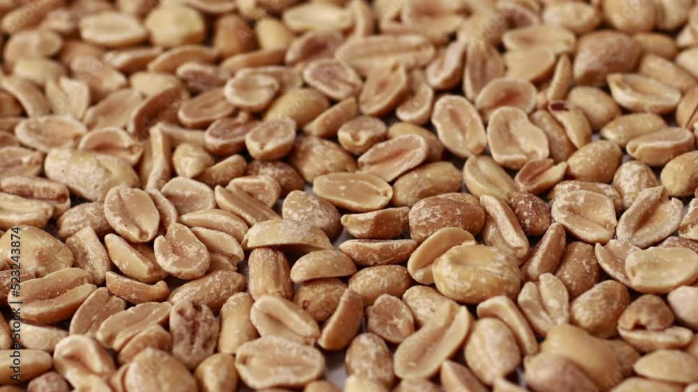 close up of peeled roasted peanuts, healthy nuts, protein food. Isolated background of roasted peanuts. Vegan food and protein nutrition close up of peeled roasted peanuts, healthy nuts, protein food. Isolated background of roasted peanuts. Vegan food and protein nutrition
