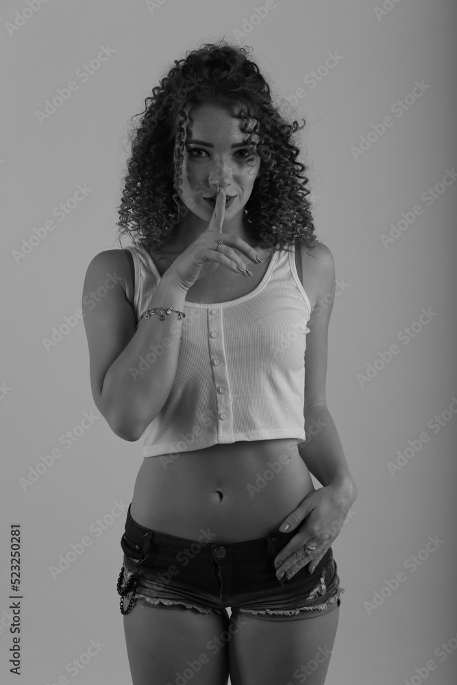Portrait of pretty curly young woman Portrait of pretty curly young woman