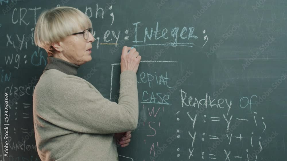 Portrait of online school tutor writing on chalkboard and talking teaching remote class. Modern technology and distant education concept. Portrait of online school tutor writing on chalkboard and talking teaching remote class. Modern technology and distant education concept.