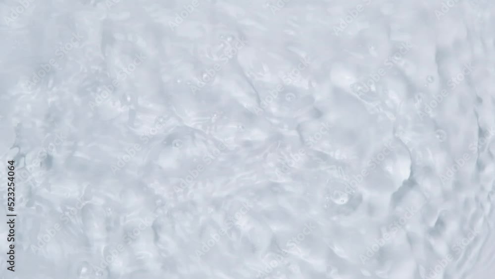 Close up view on Water texture with waves on the water overlay effect for video mockup. Organic light gray drop shadow caustic effect with wave refraction of light. Slow motion full HD video banner. Close up view on Water texture with waves on the water overlay effect for video mockup. Organic light gray drop shadow caustic effect with wave refraction of light. Slow motion full HD video banner.