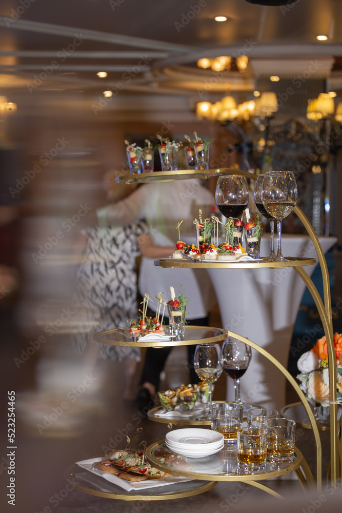a stand for various snacks at the event. catering on holiday a stand for various snacks at the event. catering on holiday
