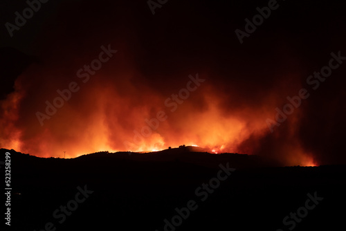 View of forest fire flames in the Moncayo, devouring hills and trees with virulence, thanks to hurricane force winds and drought