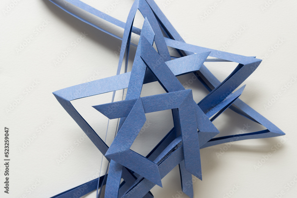 folded blue paper frames on a light background folded blue paper frames on a light background