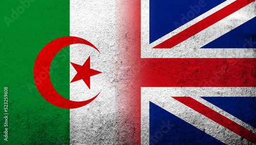 National flag of United Kingdom (Great Britain) Union Jack with Republic of Algeria. Grunge background