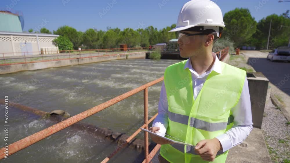 Environmental engineer.
The engineer working in the waste water pool works with his tablet.
Environmental engineer.
The engineer working in the waste water pool works with his tablet.