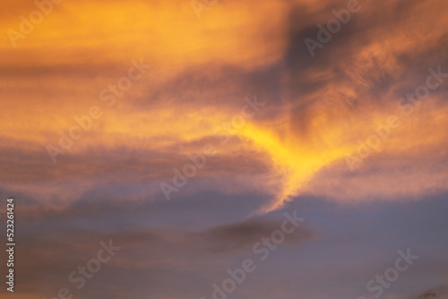 Beautiful bright sunset on the sky, sky with clouds in the evening