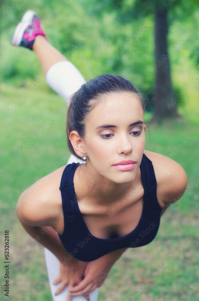 Young woman exercise in the summer nature Young woman exercise in the summer nature