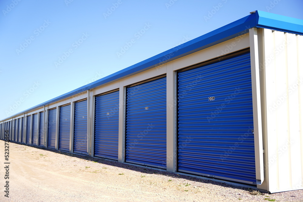 Blue storage unit buildings site. Blue storage unit buildings site.