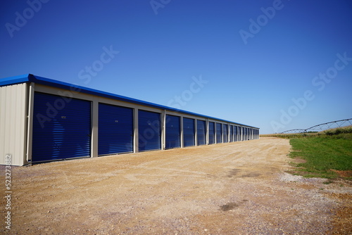 Blue storage unit buildings site.