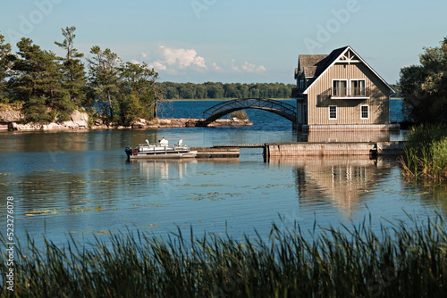 Beautiful scenery of Thousand Islands National Park, house on the river, Ontario, Canada photo