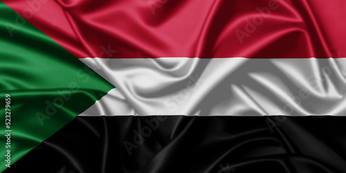 Sudan waving flag close up satin texture background