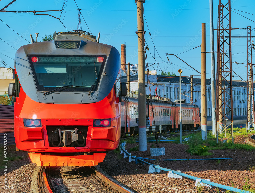 Sixcar commuter train on the running along the railway track