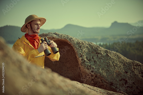 adventurer in mountains photo