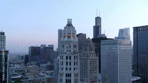 Aerial Backward Shot Of Tribune Tower In Residential City - Chicago, Illinois photo