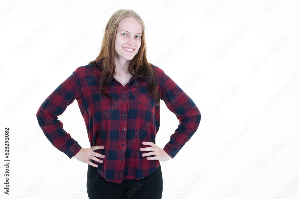smiling young woman in hipster shirt hands on waist beauty poses in white background aside blank copy space smiling young woman in hipster shirt hands on waist beauty poses in white background aside blank copy space