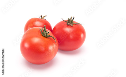 Fresh mini tomatoes isolated on white background.