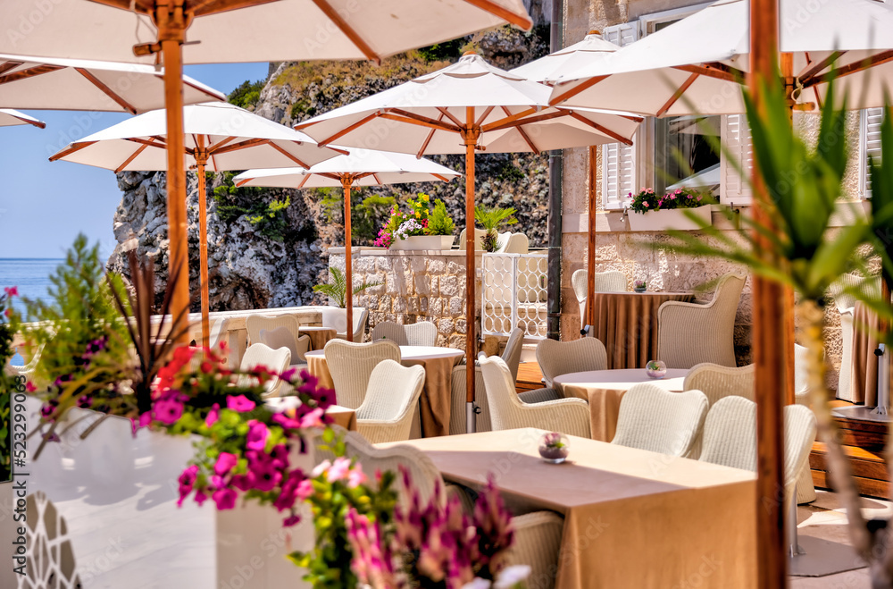 Restaurant patio in Dubrovnik, Croatia with views of the Adriatic Sea
