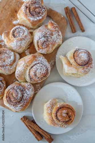 sweet home made cinnamon roll buns on a table