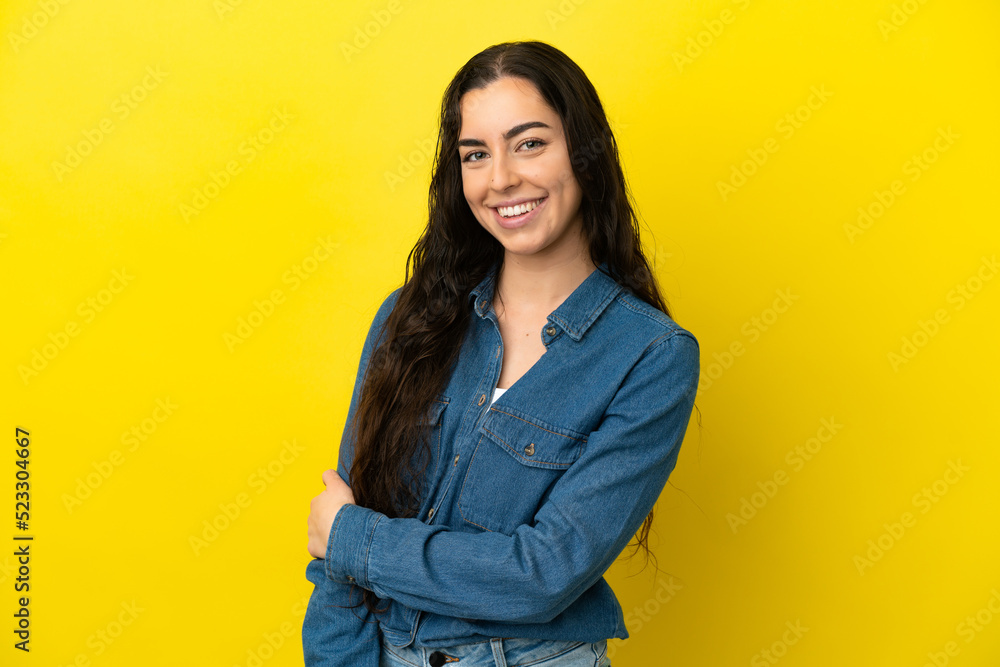 Young caucasian woman isolated on yellow background laughing Young caucasian woman isolated on yellow background laughing