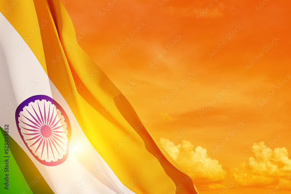 Waving India flag on sunset sky. Background with place for your text ...