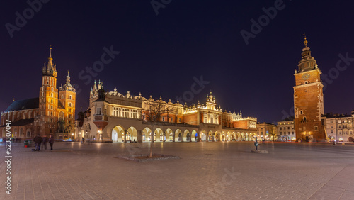 Old town square in Krakow at night, Poland. St. Marys Basilica © k_samurkas