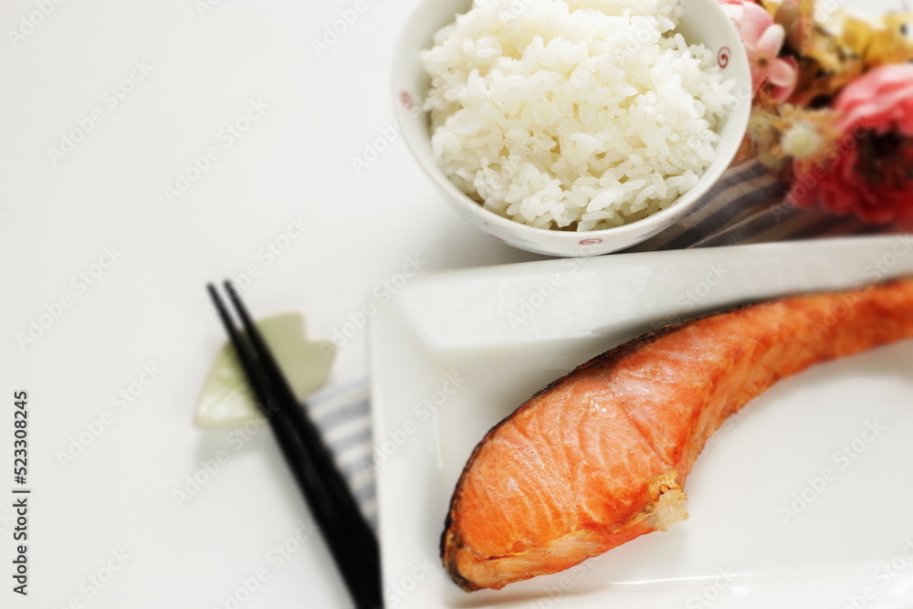 Japanese food, grilled salmon fillet served with rice Japanese food, grilled salmon fillet served with rice