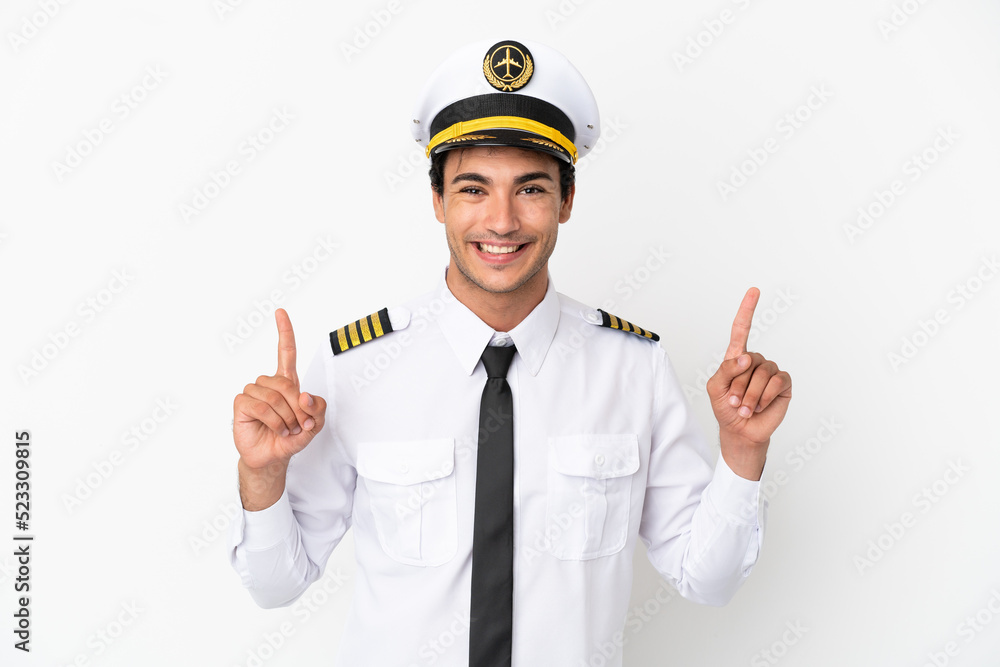 Airplane pilot over isolated white background pointing up a great idea Airplane pilot over isolated white background pointing up a great idea