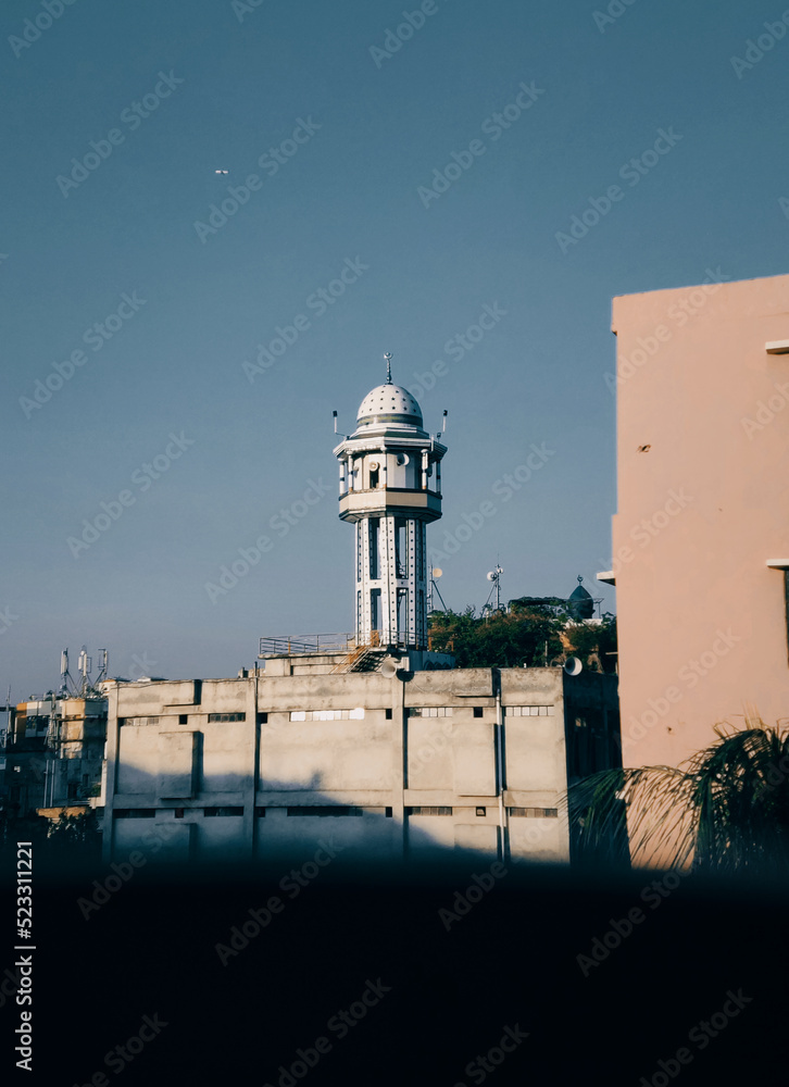 Subtly illuminated newly built mosque minar