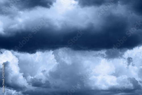 Dark cloudy sky before thunderstorm. Storm gloomy heaven. Nature dramatic skyscape background