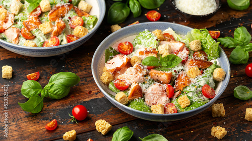 Salmon Caesar salad with grilled fish, croutons and cherry tomatoes