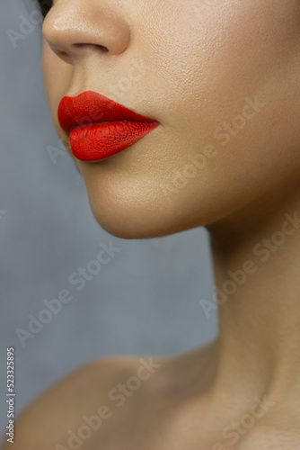 Closeup plump Lips. Lip Care, Augmentation, Fillers. Macro photo with Face detail. Natural shape with perfect contour. Close-up perfect lip makeup beautiful female mouth. Plump sexy full red lips