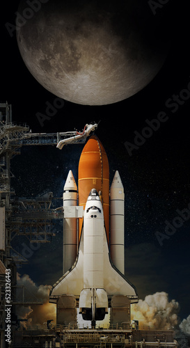 Fototapeta Naklejka Na Ścianę i Meble -  Space Shuttle takes off into space. Elements of this image furnished by NASA.