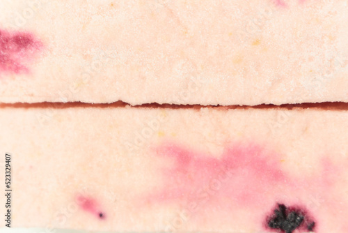 Pink fruit marshmallow with cranberries closeup. photo