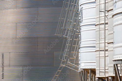 Grain storage silos on a farm photo
