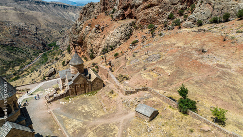 panoramic view of a mountain landscape with an old Christian church against the sky in Armenia taken from a drone