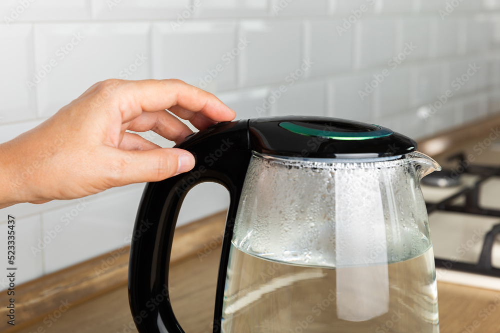 Glass kettle boiling electric hi-res stock photography and images