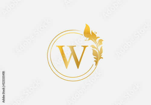 Golden leaf and circle logo design vector. Golden beauty and business symbol and alphabets vector design W