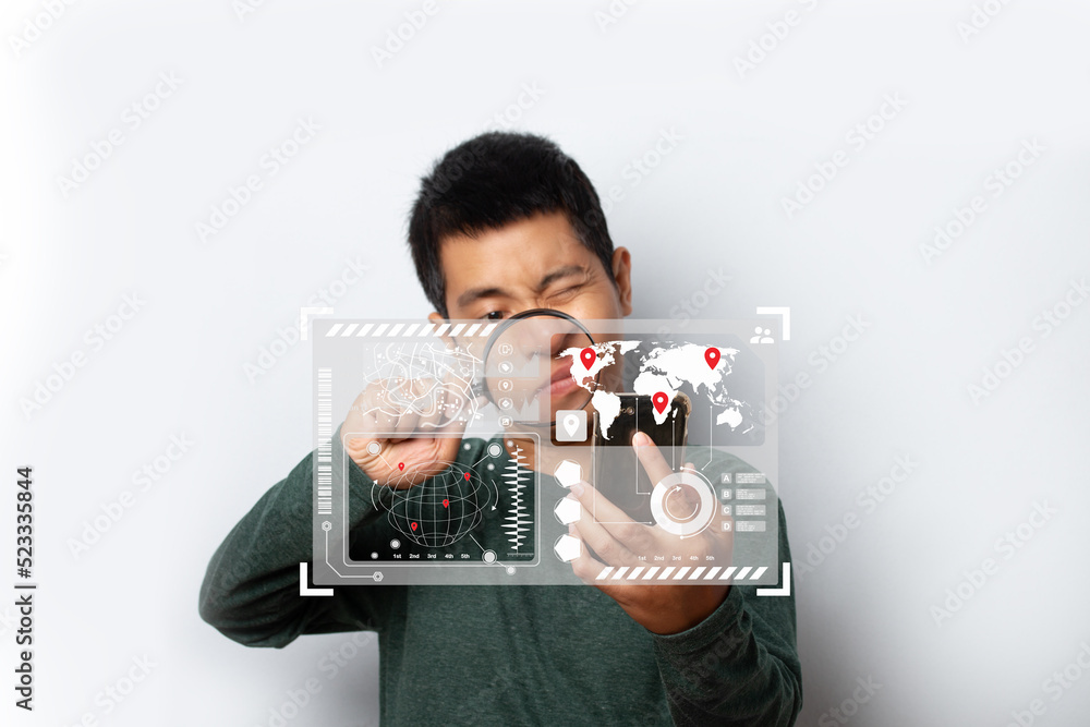 Man using smartphone and magnifying glass find virtual model map with location point. Man using smartphone and magnifying glass find virtual model map with location point.