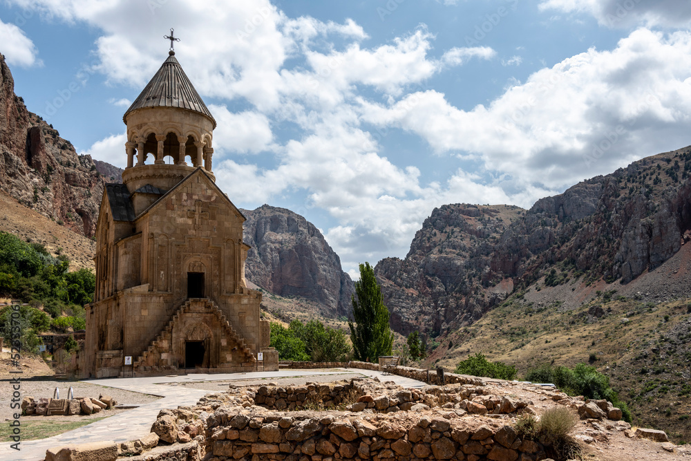 landscape with views of ancient stone buildings and temples on a summer day in Armenia landscape with views of ancient stone buildings and temples on a summer day in Armenia