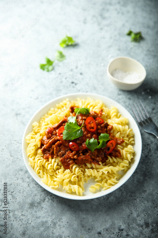Pasta with spicy meat ragout and chili Pasta with spicy meat ragout and chili