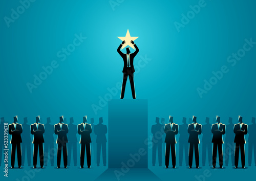 Businessman holding up a star on stage